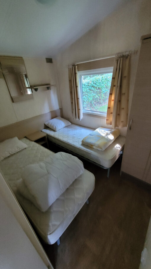 Slaapkamer met 2 tweepersoonsbedden